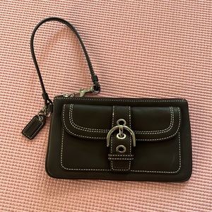 Dark Brown Leather Coach Wristlet with white stitching